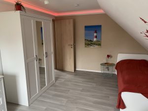 Schlafzimmer “Leuchtturm” – Ferienhaus Sandhöcht in Großheide